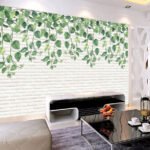 Papier peint – Feuilles vertes sur briques blanches