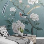 Papier peint – Fleurs blanches sur fond bleu doux