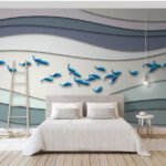 Papier peint – Poissons bleus et vagues graphiques