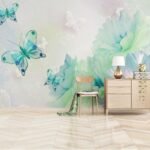 Papier peint – Papillons turquoise sur fond pastel