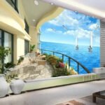 Papier peint – Terrasse et voiliers sur mer bleue