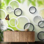Papier peint – Cercles graphiques et papillons sur fond vert