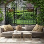 Papier peint – Portail ancien ouvert sur un jardin vert