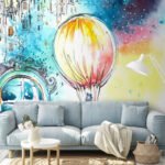 Papier peint – Montgolfière dans une ville multicolore