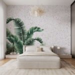 Papier peint – Feuilles de bananier sur fond beige patiné