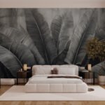Papier peint – Grandes feuilles grises sur fond sombre