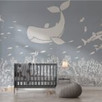Papier peint – Baleine blanche et petits poissons sur fond gris
