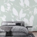 Papier peint – Feuilles blanches sur fond vert pastel