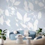 Papier peint – Feuilles blanches sur fond bleu pastel