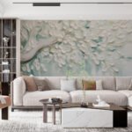 Papier peint – Arbre fleuri blanc sur fond vert d’eau