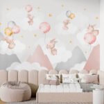Papier peint – Lapins et ballons roses au-dessus des montagnes