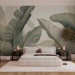 Papier peint – Grandes feuilles vert grisé sur fond beige