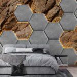 Papier peint – Hexagones gris sur roche dorée