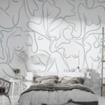 Papier peint – Visages au trait noir sur fond blanc