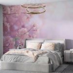 Papier peint – Branches roses sur fond mauve brumeux