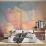 Papier peint – Nuages pastel orange, rose et bleu