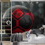 Papier peint – Ballon de football rouge sur fond noir