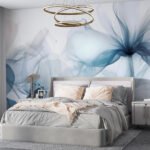 Papier peint – Fleurs bleues en transparence sur fond clair