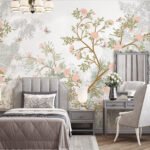 Papier peint – Arbustes fleuris orangés sur fond clair