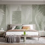 Papier peint – Feuilles blanches sur fond vert graphique